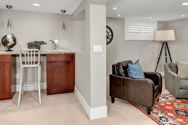 interior space featuring pendant lighting, recessed lighting, baseboards, and light carpet