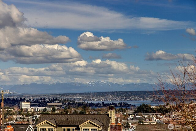 mountain view featuring a city view