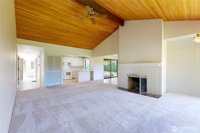 unfurnished living room featuring light carpet, wooden ceiling, ceiling fan, a brick fireplace, and high vaulted ceiling