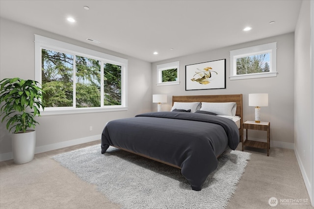 bedroom featuring carpet, visible vents, baseboards, and recessed lighting