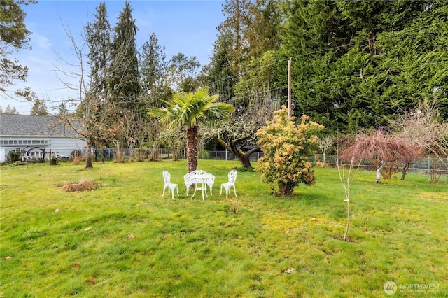 view of yard with fence