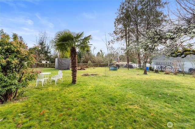 view of yard featuring fence