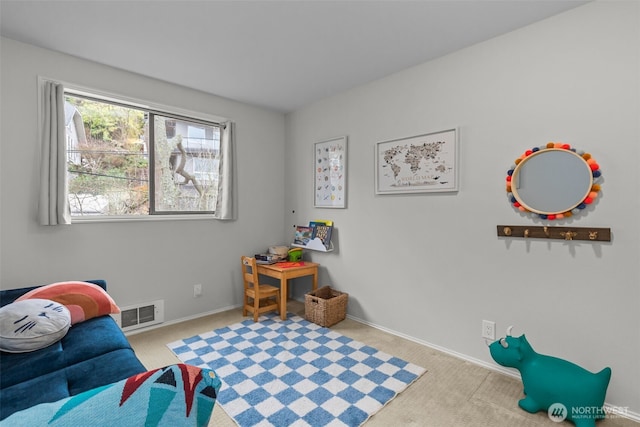 game room featuring carpet, visible vents, and baseboards