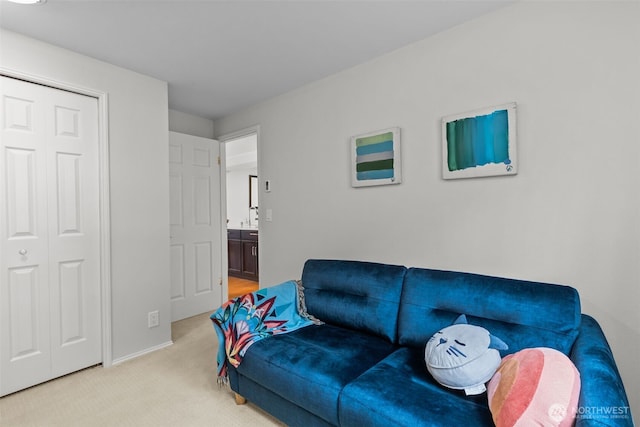 living room featuring light carpet and baseboards