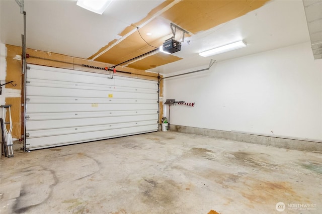 garage featuring a garage door opener