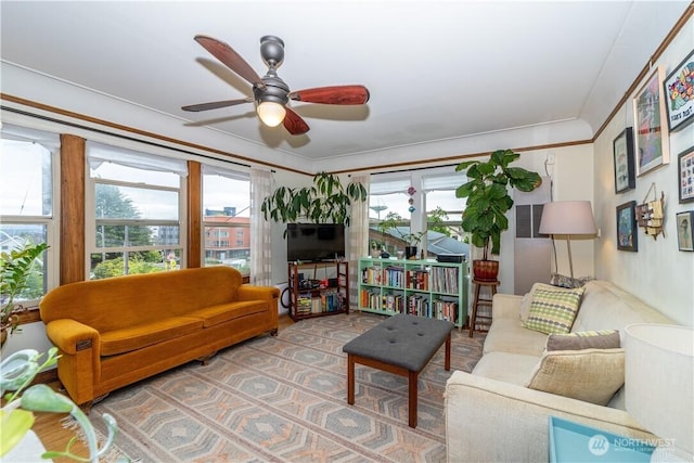 sunroom / solarium with ceiling fan