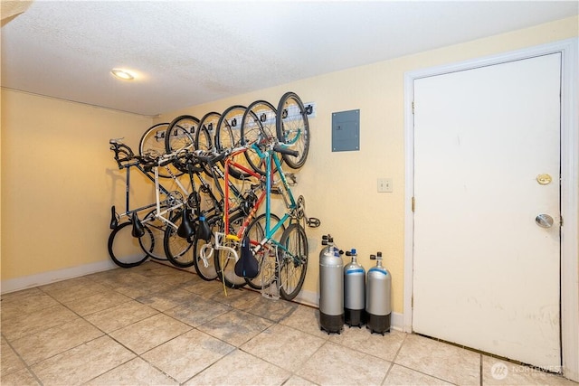 garage featuring bike storage and baseboards