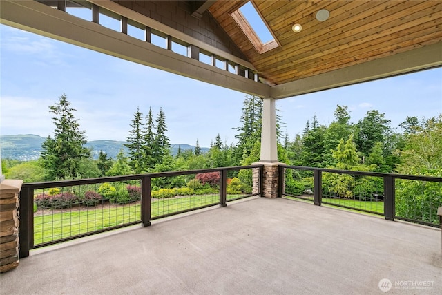 view of patio / terrace with a mountain view