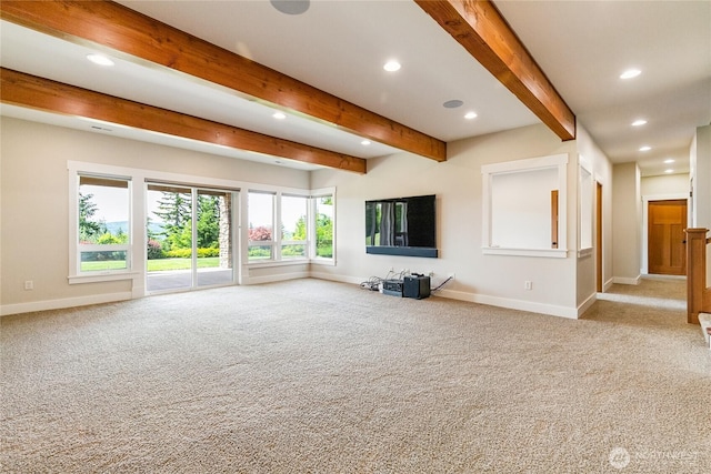 unfurnished living room with recessed lighting, beamed ceiling, and baseboards