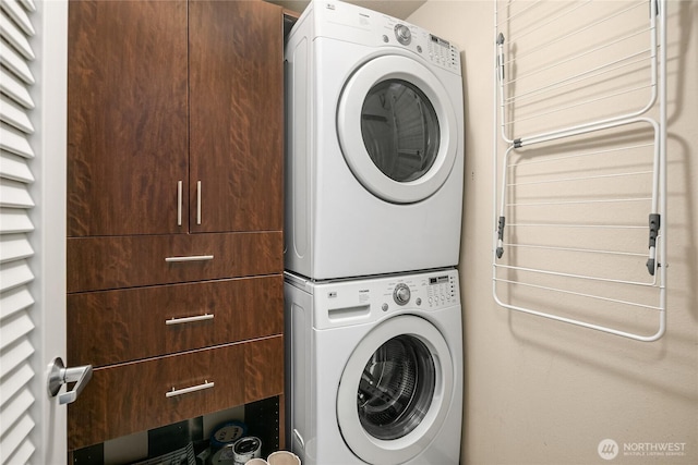 washroom with laundry area and stacked washer and dryer