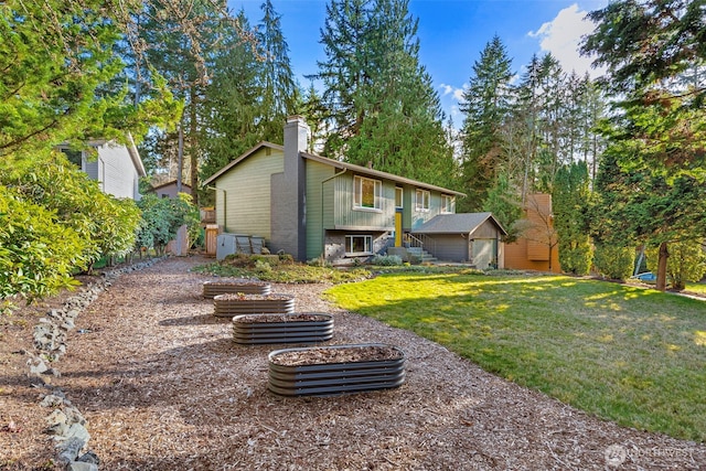 back of property featuring an outdoor structure, a lawn, brick siding, and a chimney