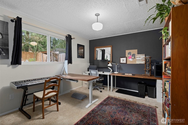 home office featuring baseboards, visible vents, carpet floors, and a textured ceiling