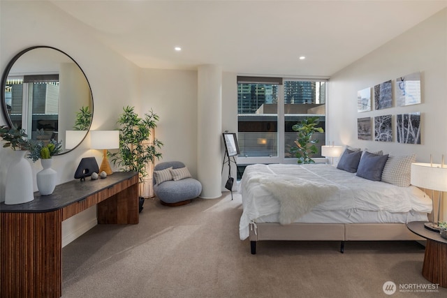 carpeted bedroom with recessed lighting