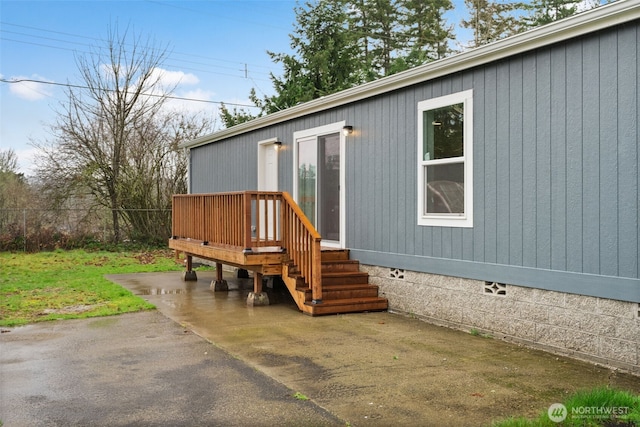 exterior space featuring crawl space, fence, and a patio