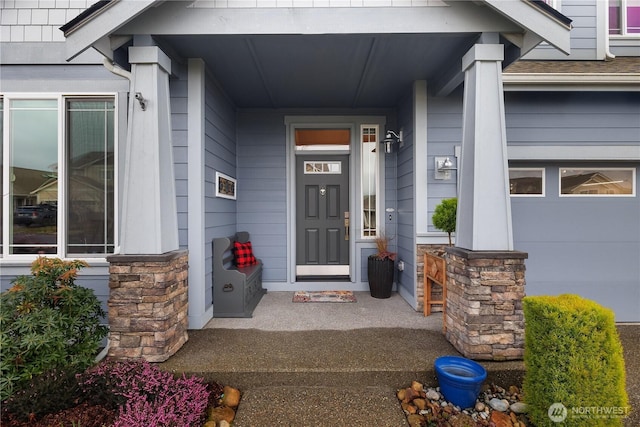 property entrance with a garage