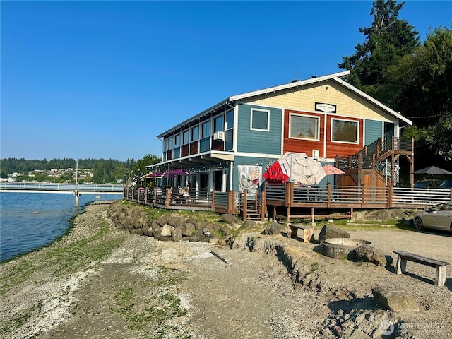 exterior space with a water view