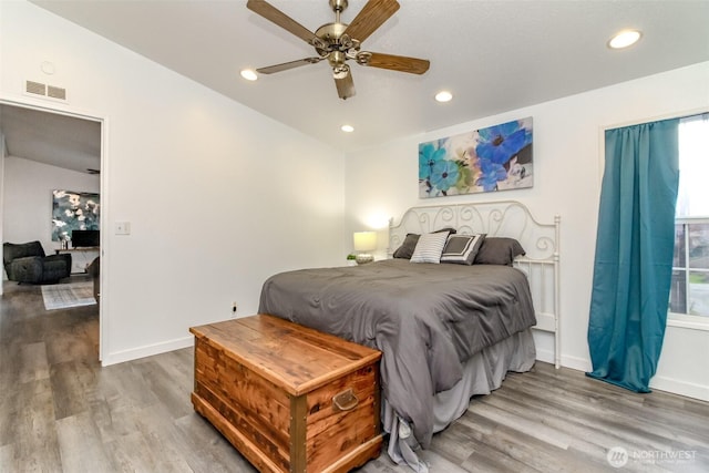 bedroom with visible vents, wood finished floors, recessed lighting, baseboards, and ceiling fan