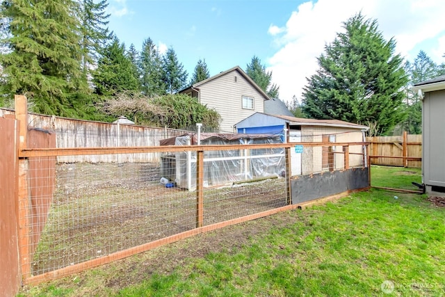 view of yard featuring a fenced backyard