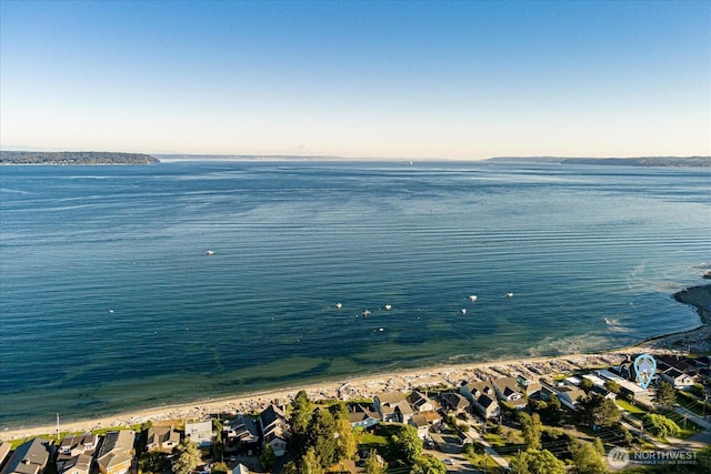 exterior space with a residential view and a water view