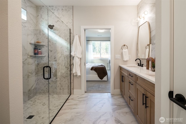 ensuite bathroom featuring a sink, marble finish floor, a marble finish shower, double vanity, and ensuite bath