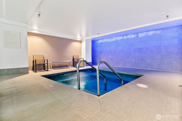 view of pool featuring an indoor in ground hot tub