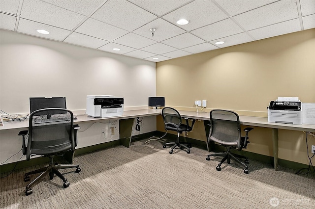 carpeted office featuring a paneled ceiling, baseboards, and recessed lighting