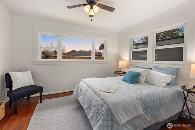 bedroom featuring ceiling fan and wood finished floors