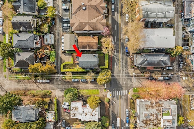 birds eye view of property with a residential view