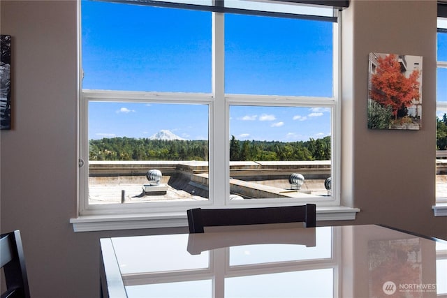 interior details featuring a view of trees