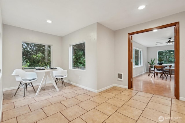 dining space with a wealth of natural light, visible vents, recessed lighting, and light tile patterned flooring