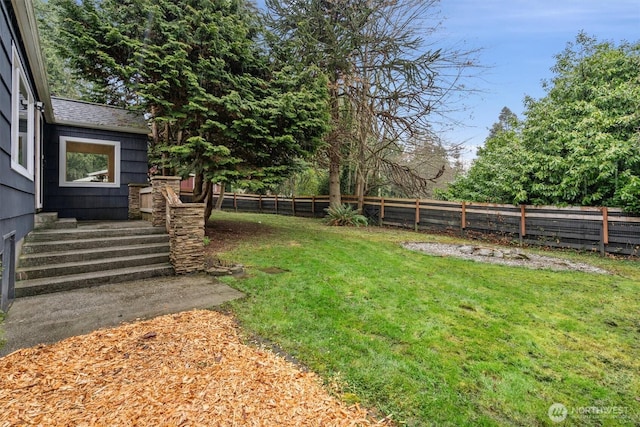 view of yard with fence