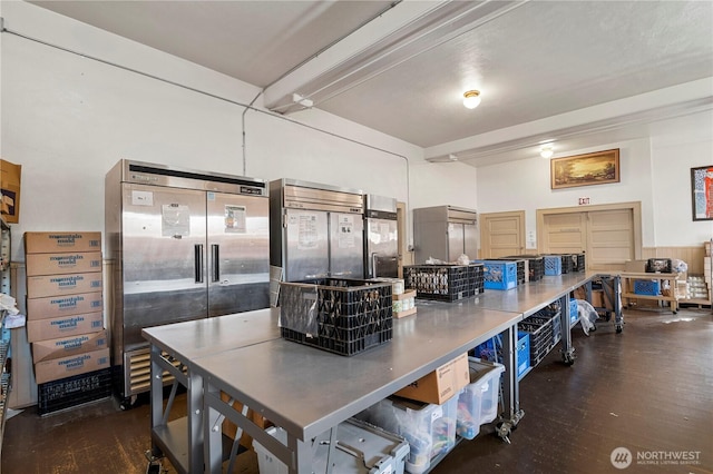 kitchen with dark wood-type flooring and high end refrigerator