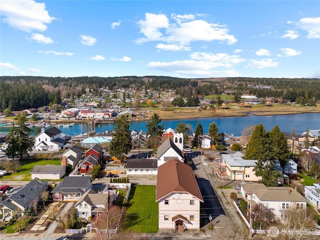 aerial view featuring a residential view and a water view