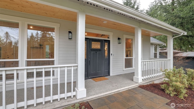 entrance to property with covered porch