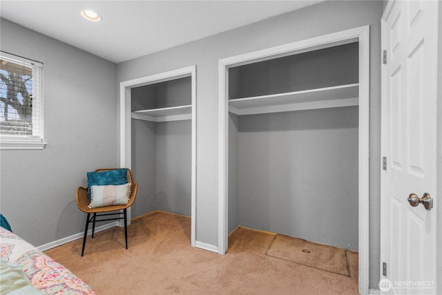 bedroom with recessed lighting and light colored carpet