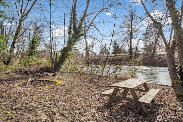 view of yard with a water view