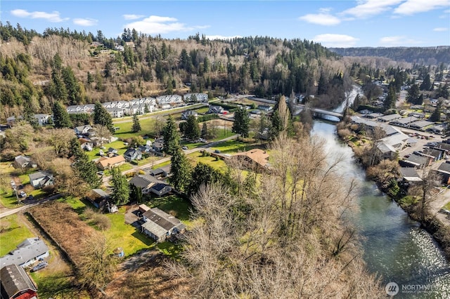 bird's eye view featuring a view of trees