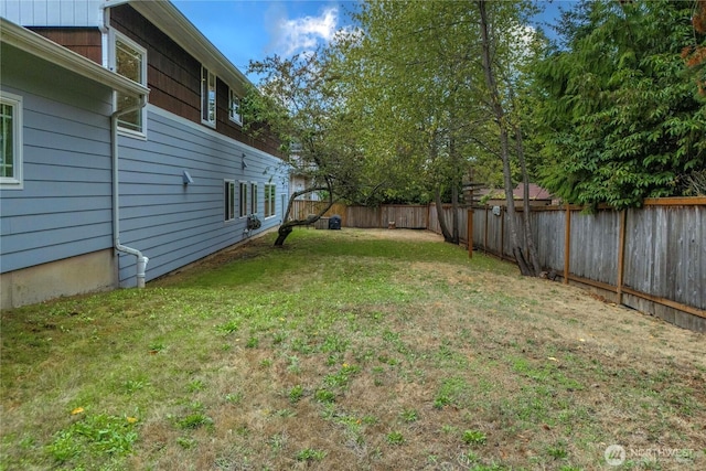 view of yard featuring a fenced backyard