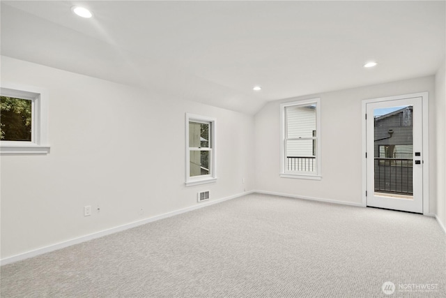 unfurnished room featuring light carpet, baseboards, visible vents, and recessed lighting