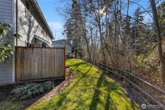 view of yard with fence