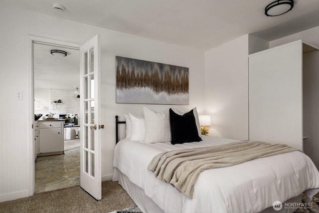 bedroom with carpet floors and french doors