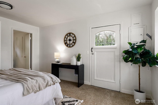 carpeted bedroom with baseboards