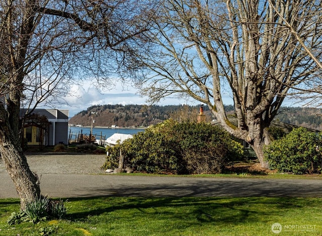 exterior space with a water view