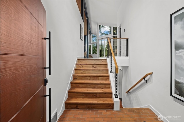 stairs with brick floor and visible vents