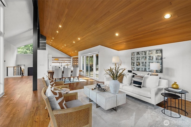 living area featuring baseboards, wood ceiling, wood-type flooring, vaulted ceiling, and recessed lighting