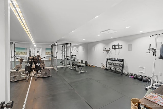 workout area featuring recessed lighting