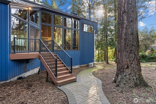 exterior space with metal roof