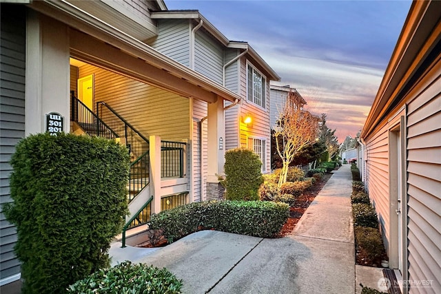 view of property exterior at dusk