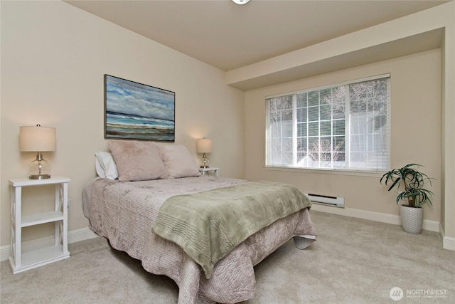 bedroom featuring carpet floors, a baseboard radiator, and baseboards