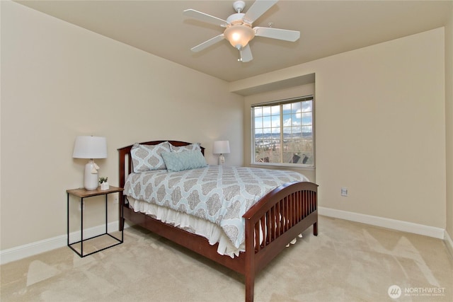 bedroom with carpet flooring, a ceiling fan, and baseboards